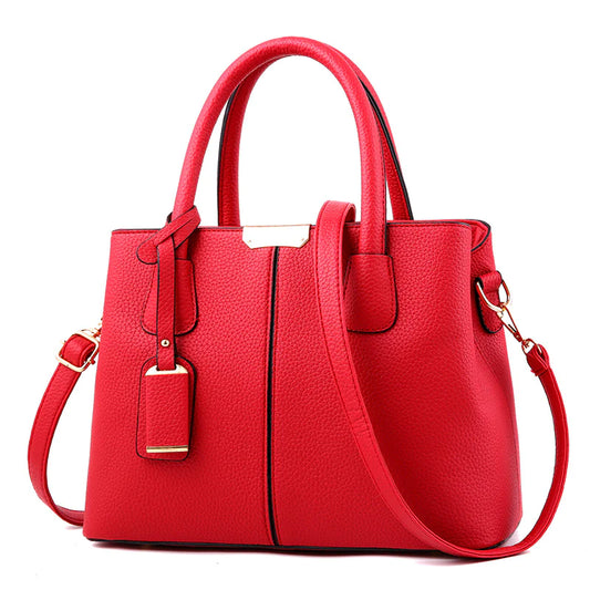 BOLSA MINIMALISTA TEXTURA LITCHI