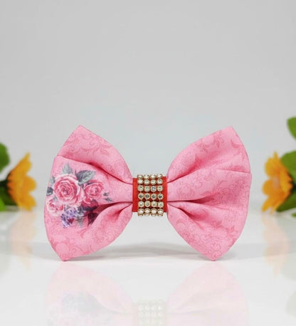 Pink bow with flower illustration and rhinestones